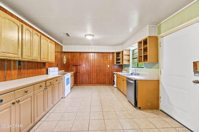 kitchen featuring light tile patterned flooring, wood walls, dishwasher, white electric stove, and sink