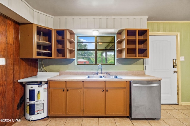 kitchen featuring ornamental molding, dishwasher, light tile patterned floors, and sink