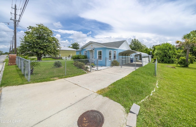 view of front of property featuring a carport and a front lawn