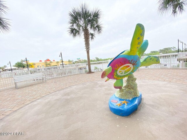 view of playground featuring a patio