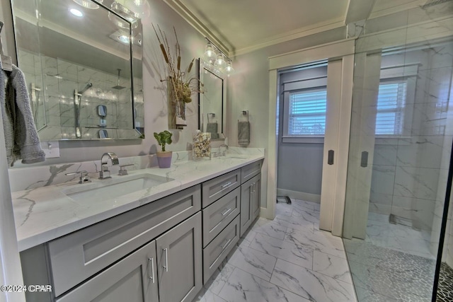 bathroom with marble finish floor, ornamental molding, a sink, and a marble finish shower