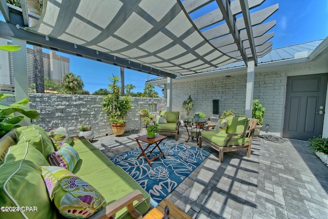 view of patio / terrace featuring an outdoor hangout area and a pergola