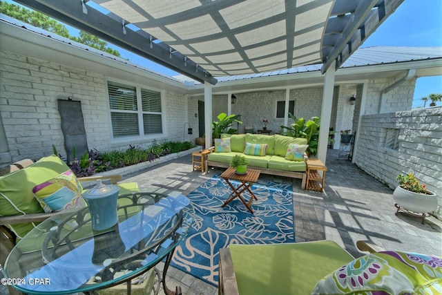 view of patio with an outdoor hangout area and a pergola