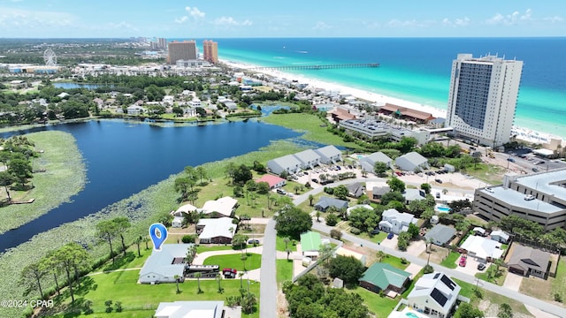 birds eye view of property with a water view