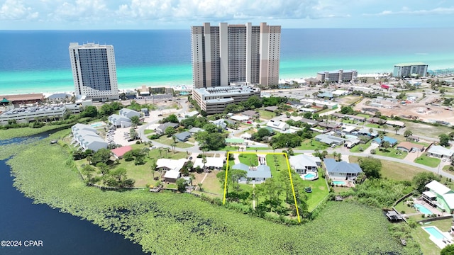 aerial view featuring a water view and a view of city