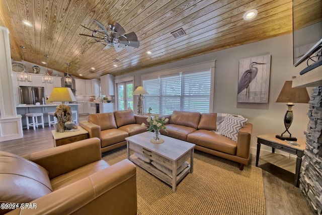 living room with recessed lighting, visible vents, wood ceiling, vaulted ceiling, and wood finished floors