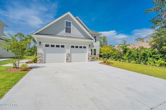 exterior space featuring a garage and a yard