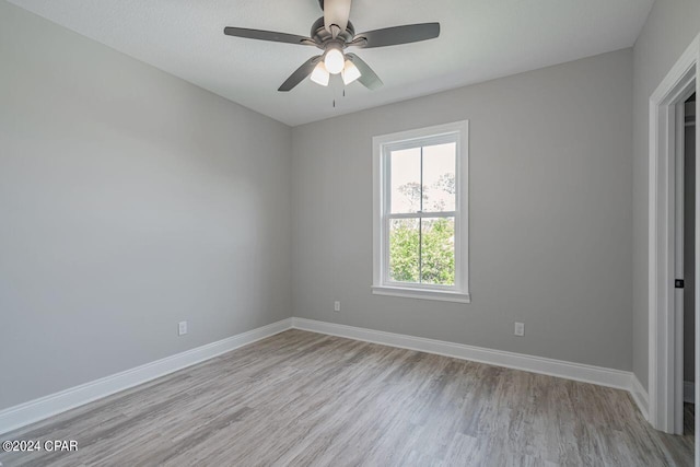 unfurnished bedroom featuring light hardwood / wood-style floors and ceiling fan