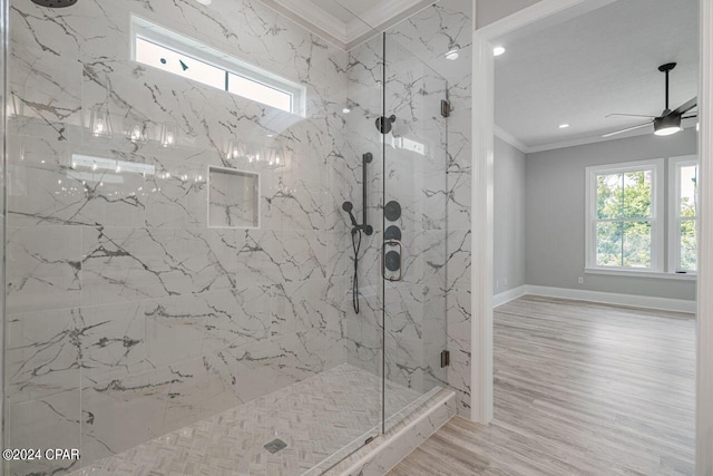 bathroom featuring crown molding, a shower with door, and hardwood / wood-style floors