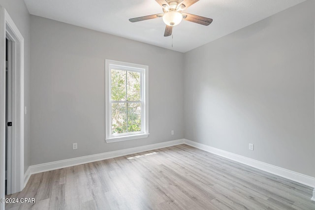 empty room featuring light hardwood / wood-style floors and ceiling fan