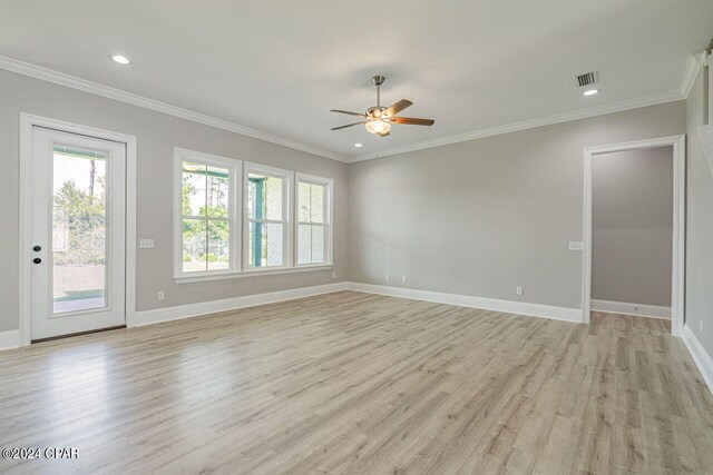 unfurnished room with a healthy amount of sunlight, light hardwood / wood-style floors, crown molding, and ceiling fan