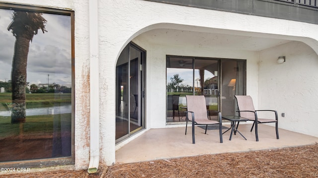 view of patio / terrace featuring a water view