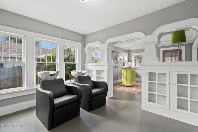 living area with hardwood / wood-style flooring