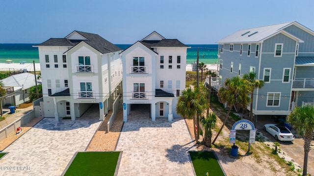 view of front of home with a water view