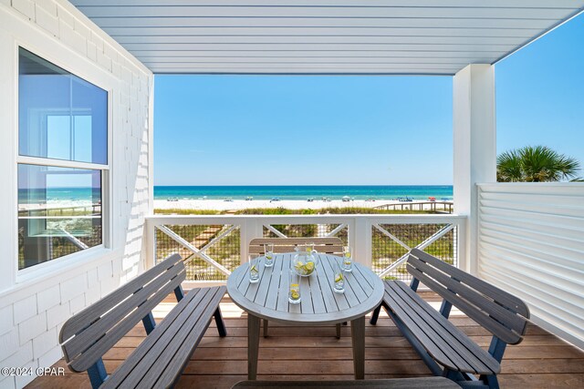 balcony featuring a water view