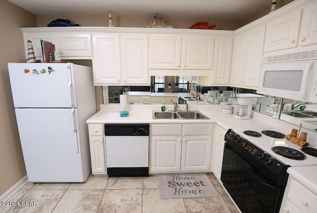 kitchen featuring light tile patterned flooring, sink, white cabinets, and white appliances