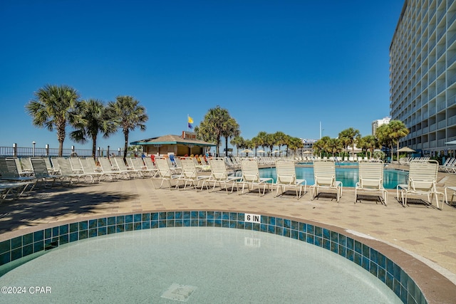 view of pool with a patio area