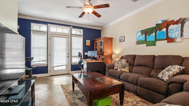 tiled living room with ornamental molding and ceiling fan