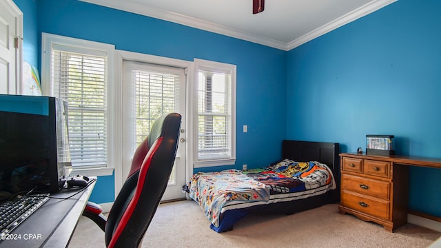 bedroom with crown molding, light colored carpet, and ceiling fan