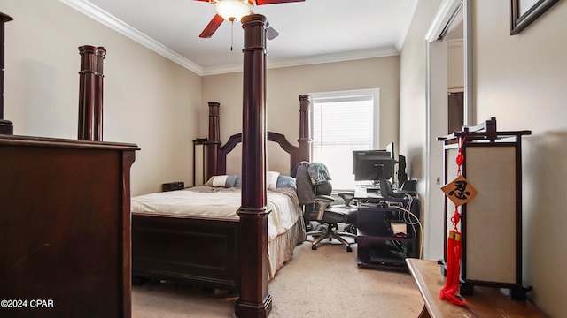 bedroom with carpet flooring, ceiling fan, and crown molding