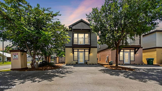 view of front of home with a balcony