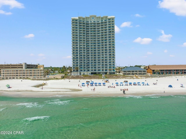 property view of water featuring a beach view