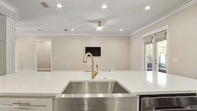 kitchen with dishwasher, sink, light stone counters, crown molding, and ceiling fan