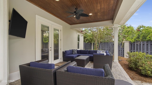 view of patio featuring ceiling fan, french doors, and an outdoor hangout area