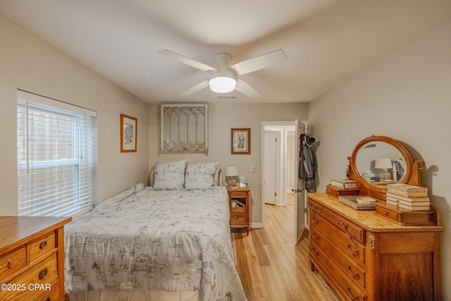 bedroom featuring ceiling fan and light wood-type flooring