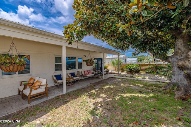 view of yard featuring french doors and a patio