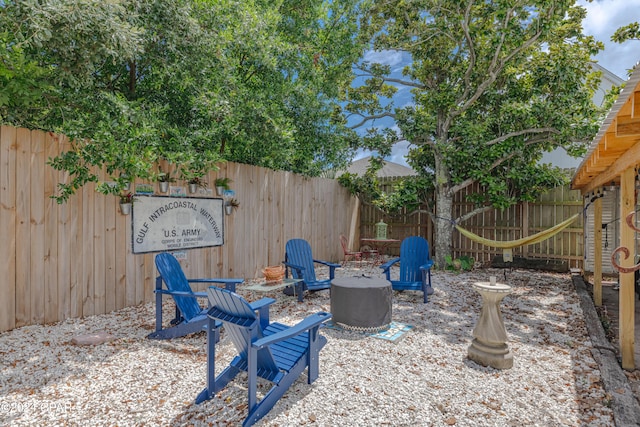 view of patio / terrace featuring a fire pit