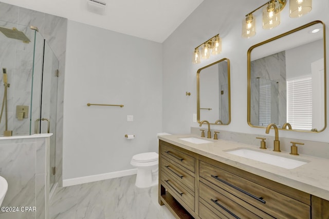 bathroom featuring vanity, toilet, and walk in shower