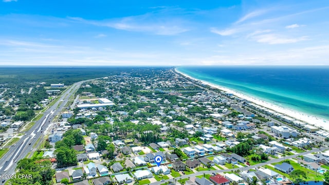 aerial view featuring a water view and a view of the beach