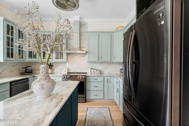 kitchen featuring black dishwasher, light hardwood / wood-style flooring, stainless steel electric range, wall chimney range hood, and refrigerator