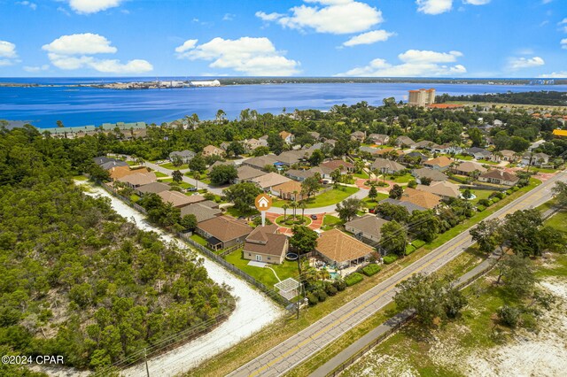 bird's eye view with a water view