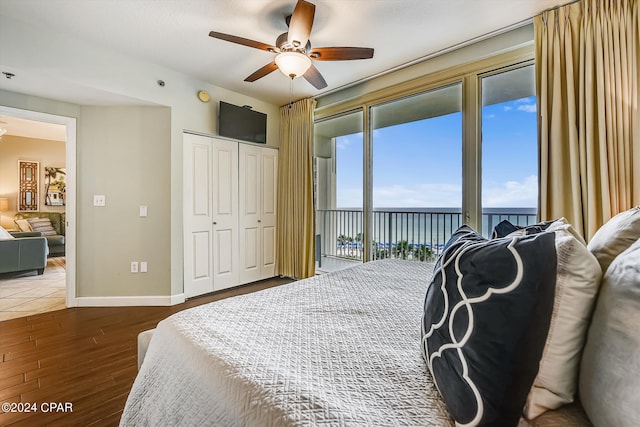 bedroom with access to exterior, a closet, and ceiling fan