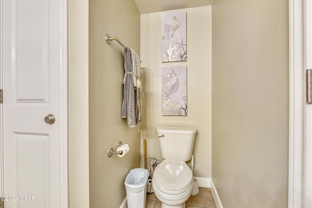 bathroom with tile patterned flooring and toilet