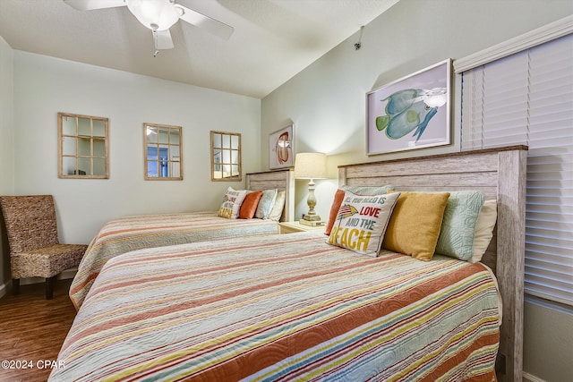 bedroom featuring hardwood / wood-style floors and ceiling fan