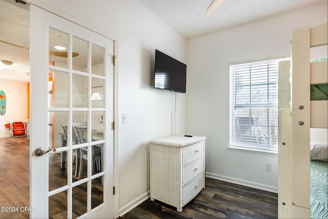 office area featuring french doors, dark hardwood / wood-style floors, and a textured ceiling