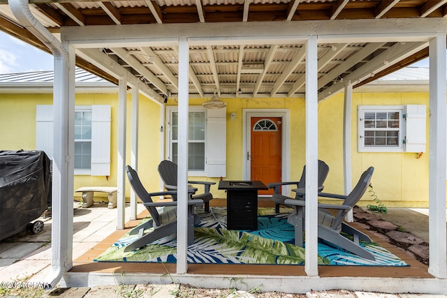 view of patio featuring a grill