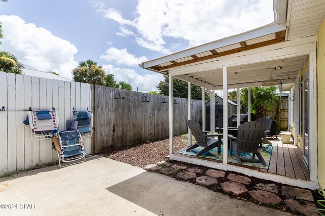 view of patio featuring an outbuilding