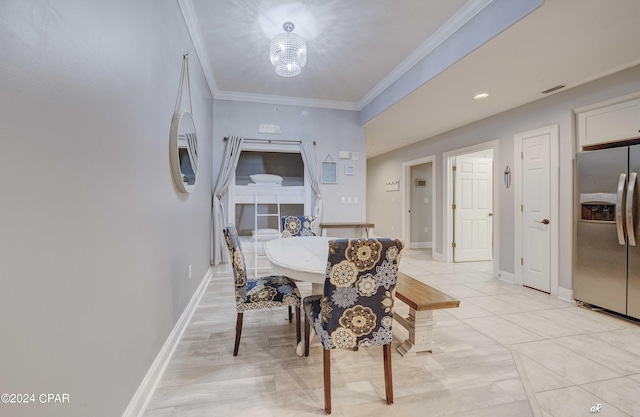 dining room with ornamental molding