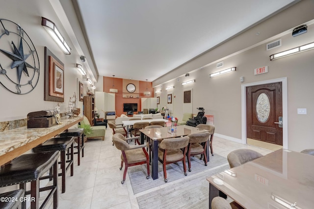 dining room with light tile patterned floors