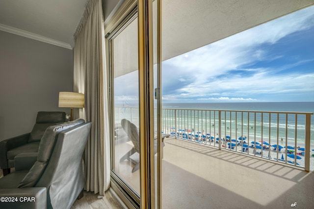 balcony with a view of the beach and a water view