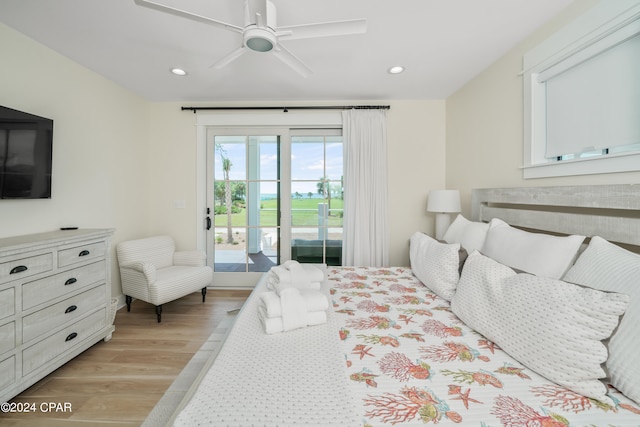 bedroom featuring access to outside, ceiling fan, and light wood-type flooring