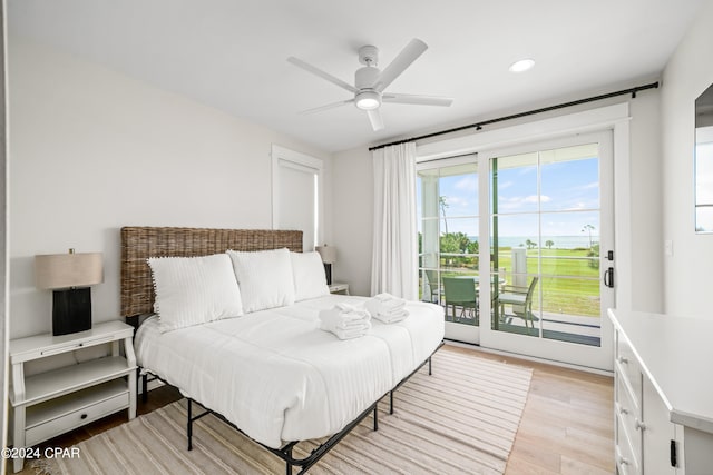 bedroom with ceiling fan, light hardwood / wood-style floors, and access to exterior