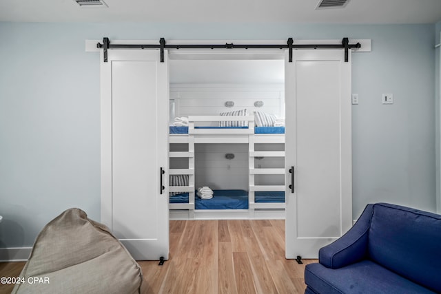 bedroom featuring hardwood / wood-style floors