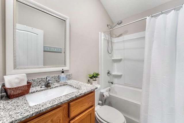 full bath with shower / bath combo, vanity, and toilet