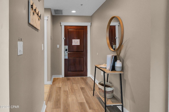 foyer featuring light wood-type flooring