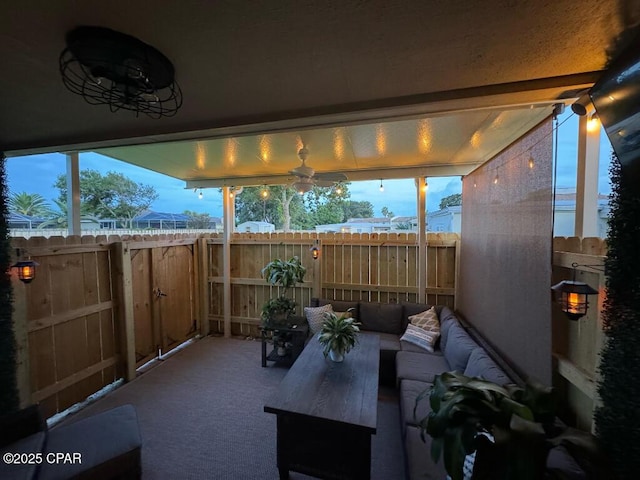 view of patio / terrace featuring fence and an outdoor hangout area